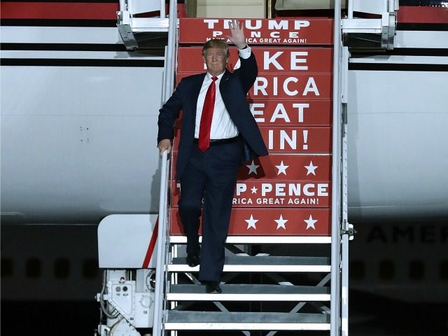 Republican presidential nominee Donald Trump steps off of his private jet as he arrives for a campaign rally at Atlantic Aviation near Albuquerque International Airport October 30, 2016 in Albuquerque, New Mexico. With less than nine days until Americans go to the polls, Trump is campaigning in Nevada, New Mexico …