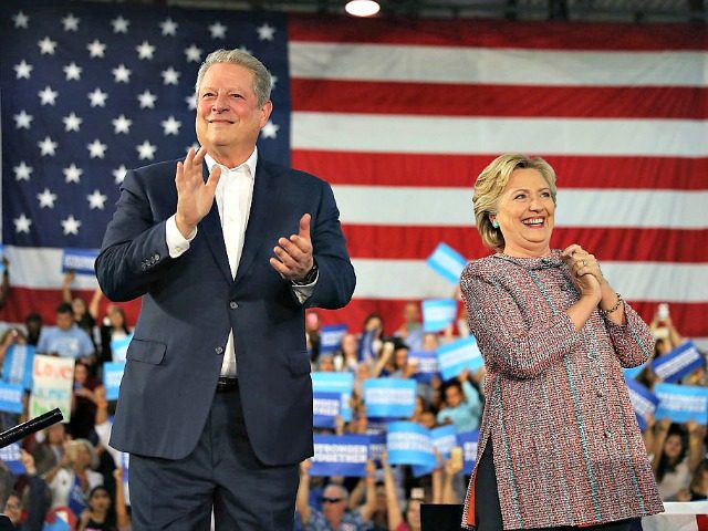 MIAMI, FL - OCTOBER 11: Democratic presidential nominee former Secretary of State Hillary Clinton and former Vice President Al Gore campaign together at the Miami Dade College - Kendall Campus, Theodore Gibson Center on October 11, 2016 in Miami, Florida.Clinton continues to campaign against her Republican opponent Donald Trump with …