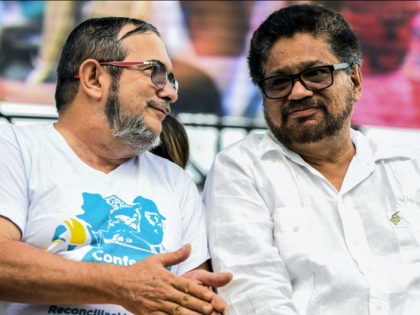 Revolutionary Armed Forces of Colombia (FARC) leaders Ivan Marquez (R) and Timoleon Jimene