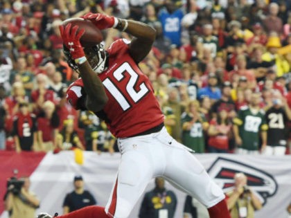 Atlanta Falcons wide receiver Mohamed Sanu (12) makes a touchdown catch against the Green Bay Packers during the second of an NFL football game, Sunday, Oct. 30, 2016, in Atlanta. The Atlanta Falcons won 33-32. (AP Photo/Rainier Ehrhardt)