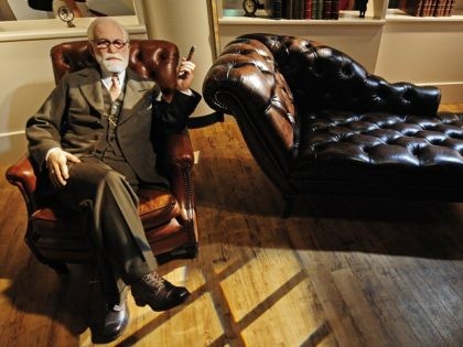 A wax likeness of Austrian founder of the psychoanalysis Sigmund Freud sits in Berlin's Madame Tussaud's wax museum, during a press preview of the museum on July 3, 2008. The museum opens to the public on July 5. AFP PHOTO DDP/ CLEMENS BILAN GERMANY OUT (Photo credit should read CLEMENS …