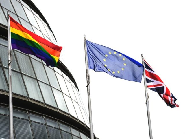 The LGBT, Union and European Union flags fly outside City Hall in central London