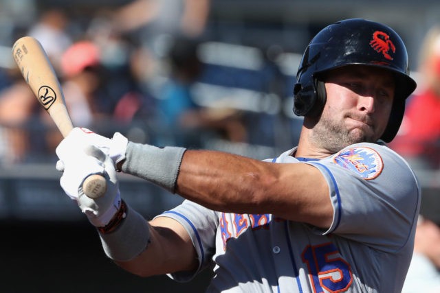 PEORIA, AZ - OCTOBER 13: Tim Tebow #15 (New York Mets) of the Scottsdale Scorpions warms