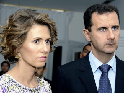 FILE - In this Tuesday, July 13, 2010 file photo, Syrian President Bashar Assad, right, an