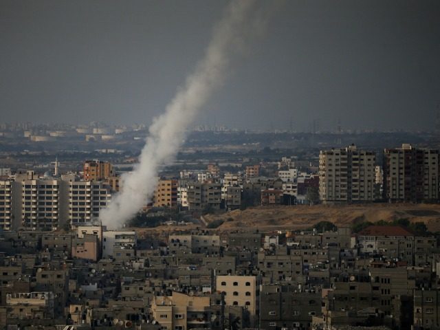 A picture taken from Gaza city shows the smoke that results from the launch of a long-rang