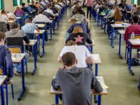 high-school-students-working-ap-photo High school students sit behind desks during the philosophy exam, the first test session of the 2016 baccalaureate (high school graduation exam) on June 15, 2016 in Dijon, France. (Sipa via AP Images)