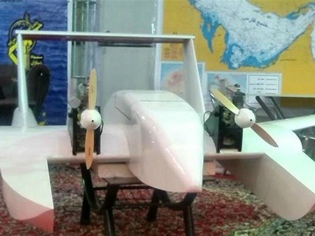 Tasnim News/AFP | Iran's elite Revolutionary Guards display a "suicide drone" capable of delivering explosives to blow up targets at sea and on land, in Tehran on October 26, 2016