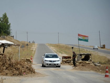 2866425 06/03/2016 A checkpoint of the Kurdish Pershmerga crossed by Sunni Arab refugees fleeing from the ISIS occupied territory towards Kurdistan, near Kirkuk. Dmitriy Vinogradov/Sputnik via AP