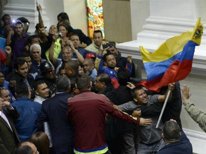 CARACAS, Oct. 23, 2016 : Supporters of the Venezuelan government interrupt a special parliamentary session at the National Assembly in Caracas, Venezuela, on Oct. 23, 2016. Venezuela's political crisis exacerbated on Sunday as the opposition-controlled parliament accused the government of blocking its campaign against President Nicolas Maduro. (Xinhua/Stringer via Getty …