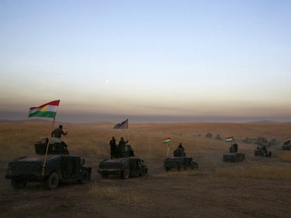 FILE -- In this Monday, Oct. 17, 2016 file photo, Peshmerga convoy drives towards a frontline in Khazer, about 30 kilometers (19 miles) east of Mosul, Iraq. In the week since Iraq launched an operation to retake Mosul from the Islamic State group, its forces have pushed toward the city …