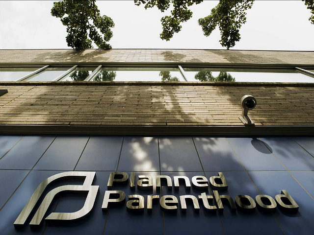A sign is pictured at the entrance to a Planned Parenthood building in New York August 31, 2015. REUTERS/Lucas Jackson