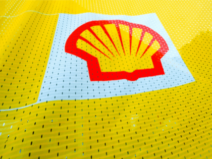 The Shell logo is seen on a flag outside a Shell petrol station in Fleet, Hampshire in southern England on July 29, 2010. British energy giant Royal Dutch Shell said Thursday that net profits jumped 15 percent to 4.393 billion dollars (3.377 billion euros) in the second quarter as it …