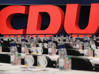 LEIPZIG, GERMANY - NOVEMBER 14: The logo of the German Christian Democrats (CDU) stands behind delegates' tables prior to the opening of the 24th CDU party congress on November 14, 2011 in Leipzig, Germany. The CDU, the senior partner in the current German coalition government, has lost ground among younger …