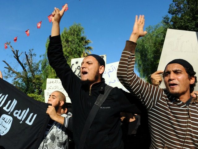 Tunisian salafists shout slogans during a demonstration in front of the assembly on Decemb