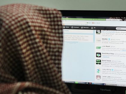 A Saudi man browses through twitter on his desktop in Riyadh, on January 30, 2013. Twitter's unmatched platform for public opinion is emboldening Gulf Arabs to exchange views on delicate issues in the deeply conservative region, despite strict censorship that controls old media. AFP PHOTO/FAYEZ NURELDINE (Photo credit should read …