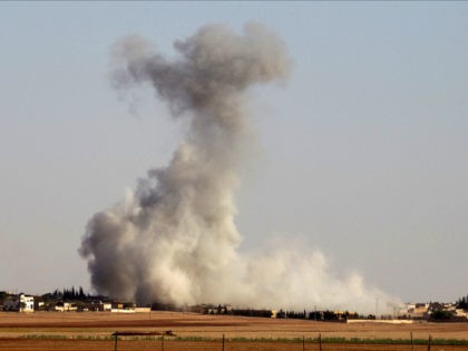 Smoke rises from airstrikes on Guzhe village, northern Aleppo countryside, Syria. REUTERS/