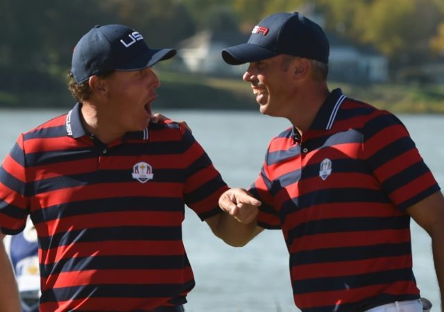 Team USA's Phil Mickelson and Matt Kuchar celebrate in the afternoon fourball matches duri
