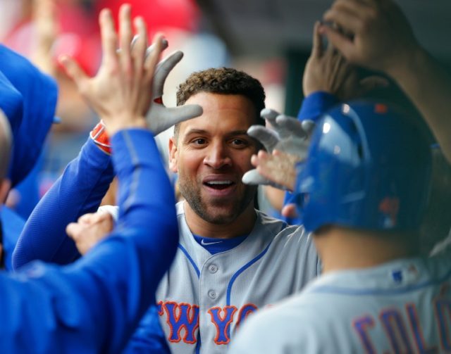 James Loney of the New York Mets is congratulated after hitting a two-run home run against