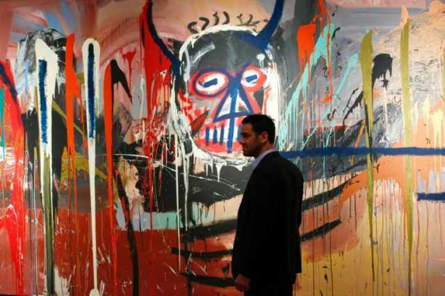 An untitled painting by Jean-Michel Basquiat pictured during a press preview for Christie'