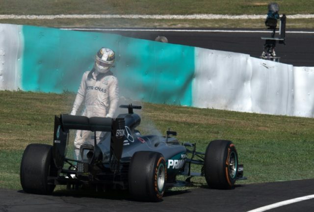 Mercedes driver Lewis Hamilton's engine exploded 15 laps from victory Sunday at the Sepang