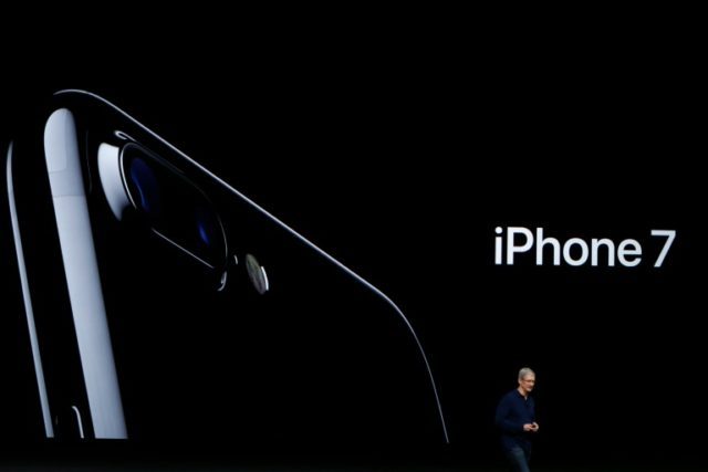 Apple CEO Tim Cook announces the new Apple iPhone 7 during a launch event on September 7,