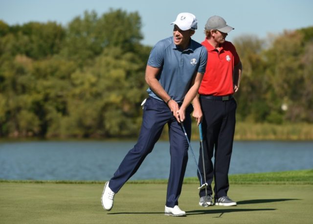 Team Europe's Danny Willett (C) and Brandt Snedeker of Team USA pictured during their four