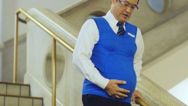 Japanese politician Shunji Kono wears a pregnancy vest in a video filmed by the Kyushu-Yam