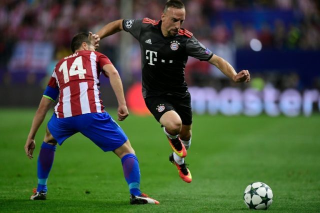 Bayern Munich forward Franck Ribery skips past Atletico Madrid midfielder Gabi during the