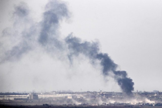 Picture taken from the Israel-Gaza border shows smoke rising from the Palestinian Hamas-ru