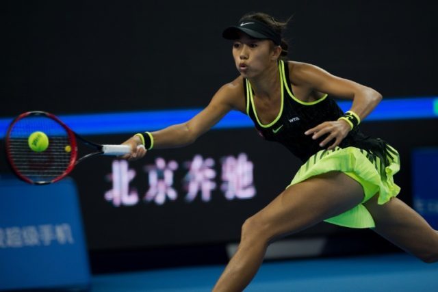 Zhang Shuai overpowered fifth-ranked Simona Halep in less than a hour, beating her 6-0, 6-
