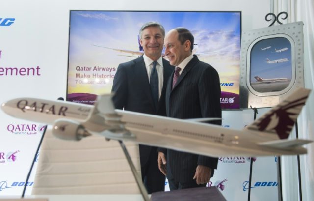 Akbar Al Baker, CEO of Qatar Airways, and Ray Conner (L), President and CEO of Boeing Comm