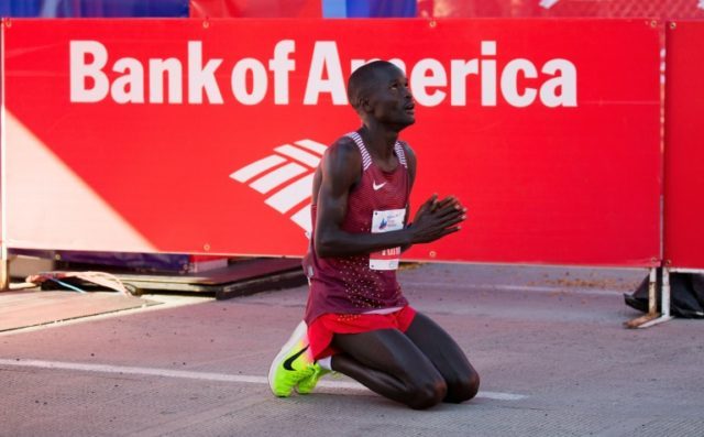 Abel Kirui celebrates after winning the Chicago Marathon