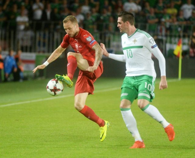 Michal Kadlec of Czech Republic (L) fights for the ball with Kyle Lafferty of Northern Ire