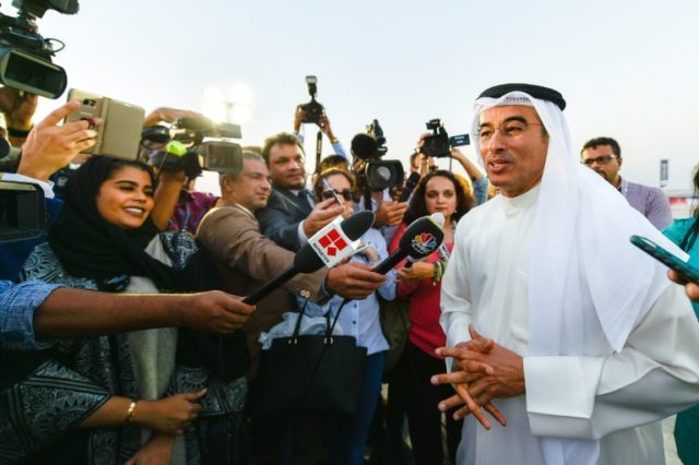 Mohammad Alabbar (R), chairman of Emaar Properties speaks to the press during a groundbrea
