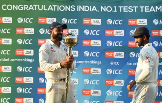 India Test cricket captain Virat Kohli holds the ICC Number 1 Test cricket team mace after