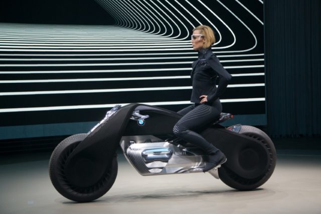 The self-balancing BMW Motorrad VISION NEXT 100 concept motorcycle is unveiled on the last