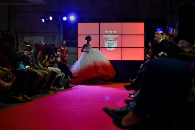 A model wears a creation by designer Micaela Oliveira during a presentation by Portuguese