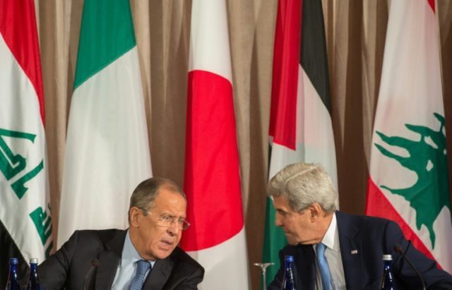 Russian Foreign Minister Sergei Lavrov (L) and US Secretary of State John Kerry (R) have a