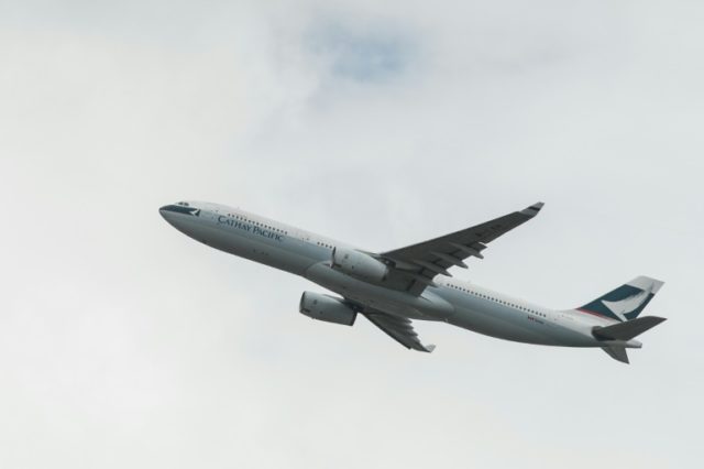 Cathay Pacific said it no longer expected business to improve in the latter half of the ye