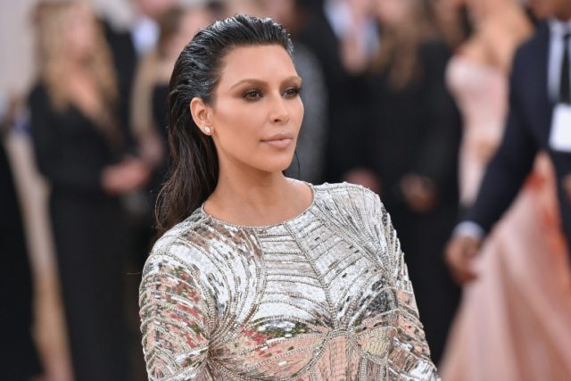 Kim Kardashian, who reportedly earns $1 million a month from social media engagements, mai