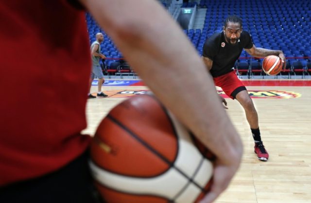 Former NBA All-Star Amar'e Stoudemire practises some dribbling during a basketball trainin