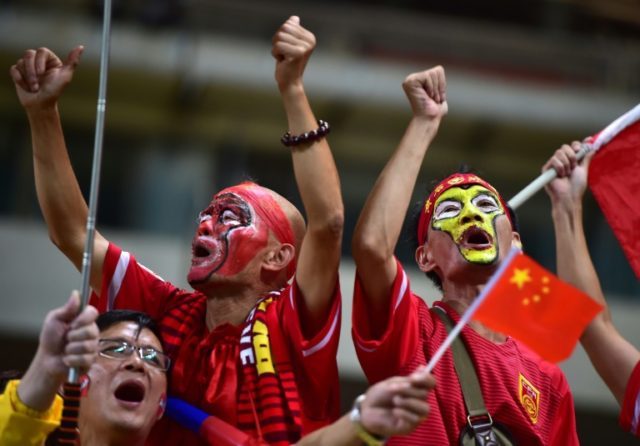 Chinese fans support their side during the 2018 World Cup qualifier against South Korea in