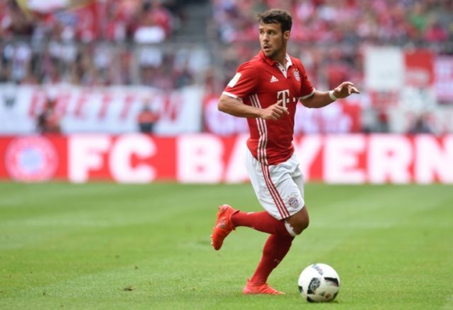 Bayern Munich's Juan Bernat looks for an opening during the match against Cologne in Munic