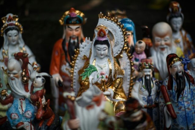 Unwanted statues of deities, gathered and repaired after their owners discarded them, perc
