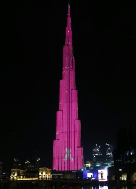 Dubai's Burj Khalifa, the world's tallest tower, is lit up in pink to raise awareness and