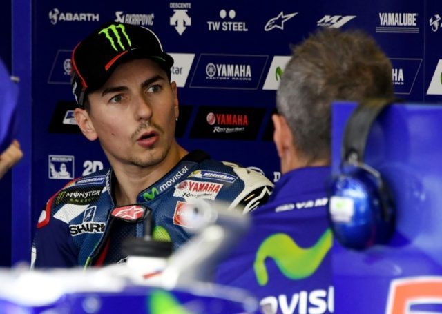 Jorge Lorenzo was launched off his bike while taking the right turn, flipping him onto gra