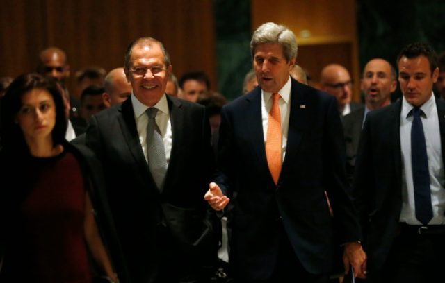 US Secretary of State John Kerry (R) is due to meet Russian Foreign Minister Sergei Lavrov