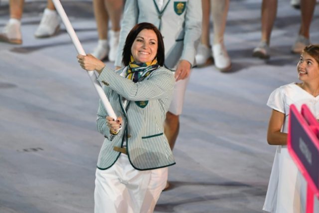Australia's flagbearer Anna Meares leads during the opening ceremony of the Rio Olympics a