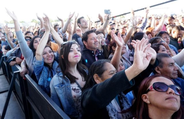 Fans cheer during the 'RiseUp As One' concert at the Cross Border Xpress grounds in Otay M