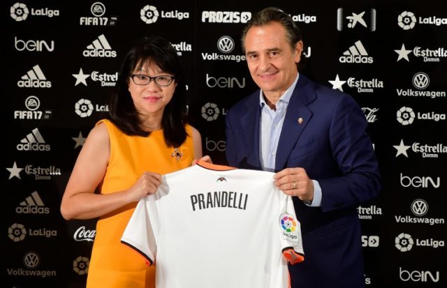 Cesare Prandelli with Valencia's Singaporean President Lay Hoon Chan at the Mestalla stadi
